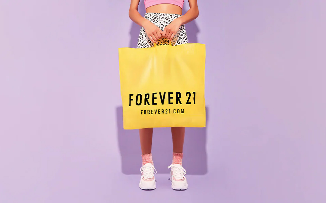 A female holding a Forever 21 bag