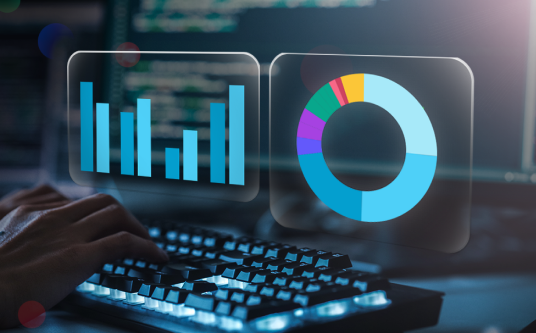 Image of data and graphs floating above keyboard